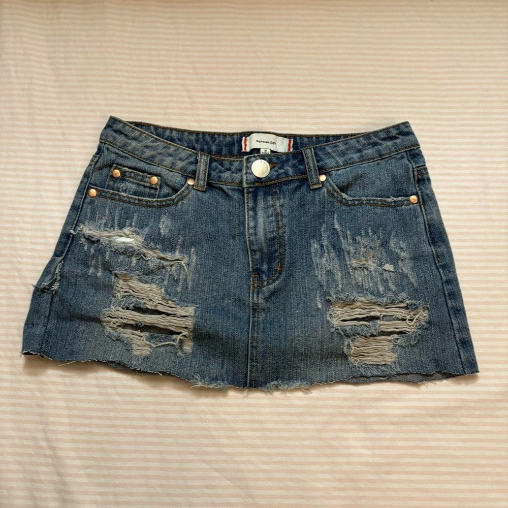 Blue ripped mini skirt